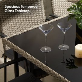 Set de exterior cu masa si 6 scaune VonHaus 2500974, cu aspect de ratan, din polietilena, blat din sticla temperata, capacitate maxima 150 kg